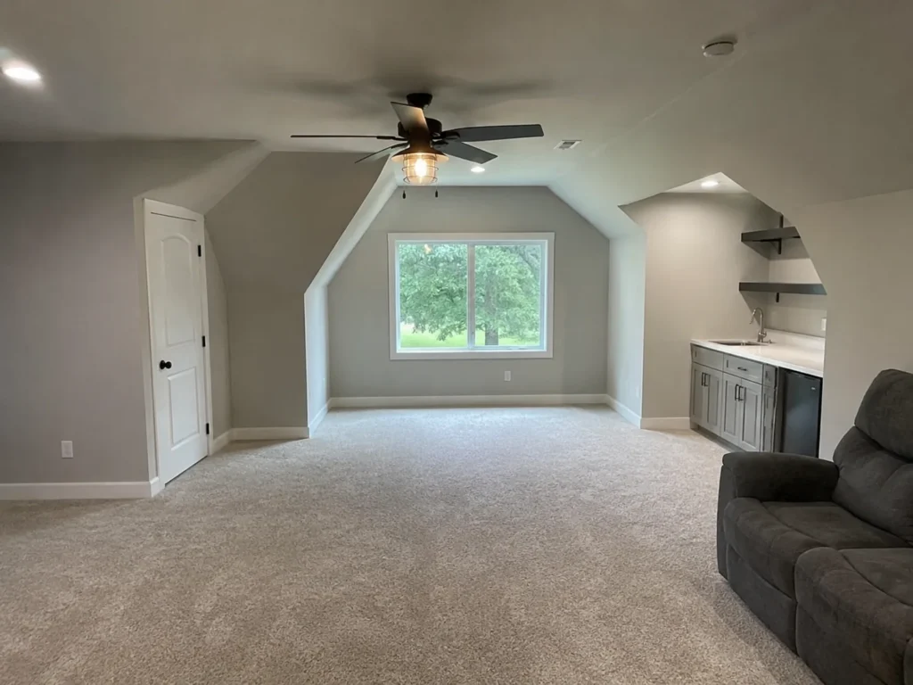 Finished above-garage bonus room in Cedar Rapids, Iowa.