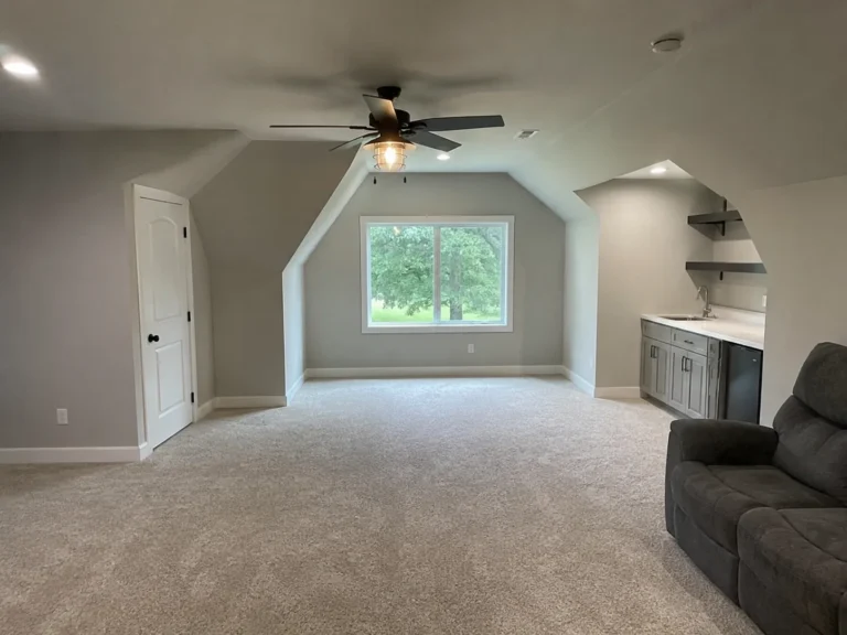 Finished above-garage bonus room in Cedar Rapids, Iowa.