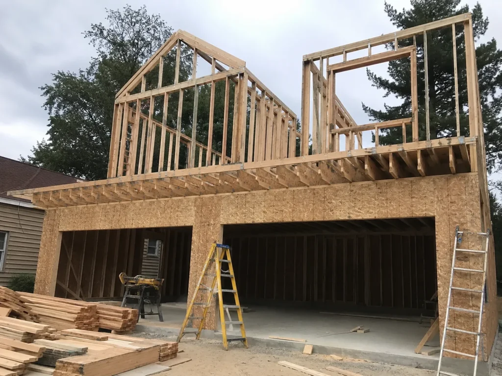 Two-story garage framing and roof truss construction in Cedar Rapids, Iowa.