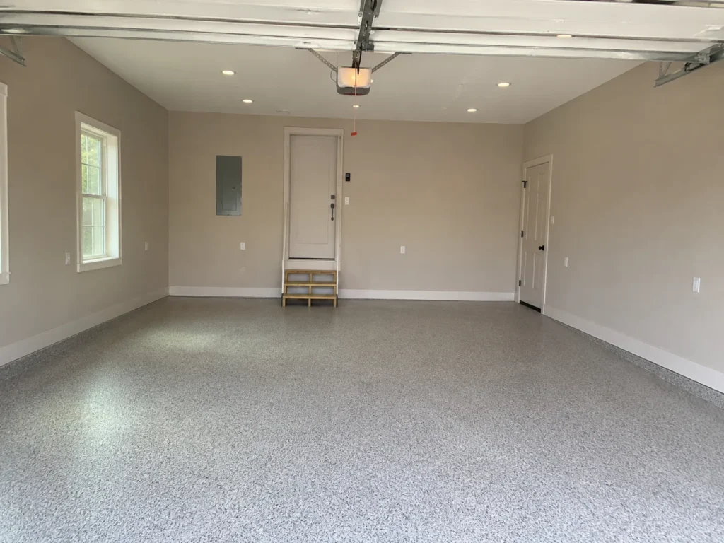 Finished garage interior with epoxy floor in Marion, Iowa.