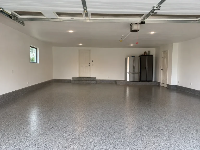Finished large garage interior with epoxy floor in Marion, Iowa.